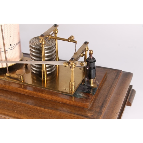 299 - Edwardian oak cased barograph, c1910, the glazed case over single drawer on bracket feet, H22cm.