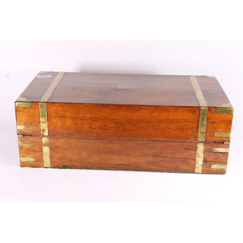 300 - Victorian walnut and brass bound writing slope, opening to reveal red leather skiver with gilt borde... 