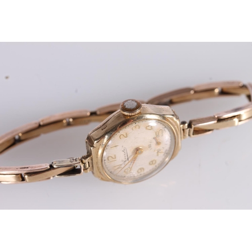 196 - Ladies Everite 9ct gold dress wristwatch on 9ct gold extender bracelet, gross 15.7g.