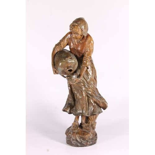 319 - Goldscheider Art Nouveau bronzed terracotta figurine of a maid pouring into a bowl, c1900, the natur... 