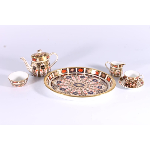 327 - Royal Crown Derby Imari pattern 1128 miniature teaset, consisting of service tray, teapot, milk jug,... 