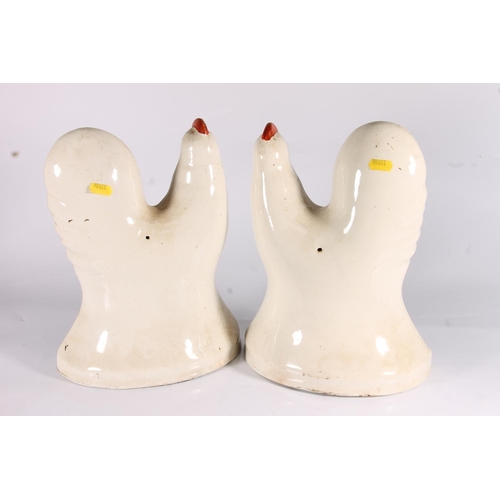 332 - Pair of Staffordshire pottery flat back cockerels, mid 19thC, the figured cockerels with painted hig... 