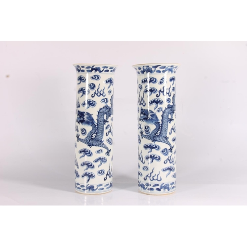 335 - Pair of Chinese blue and white porcelain sleeve vases, Guangxu period, the flared bodies decorated w... 