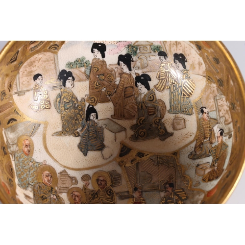 338 - Japanese Satsuma pottery bowl, late Meiji period, decorated with a village showman and children by a... 