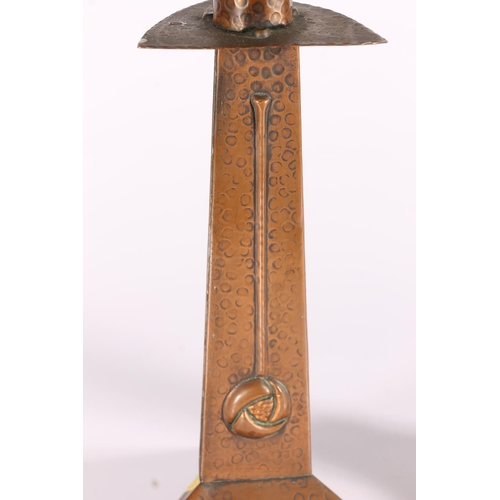 342 - Arts and Crafts style copper candlesticks, early 20th century, the tapering symmetrical sticks with ... 