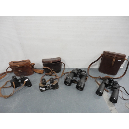 102 - Pair of Ross of London binoculars, cased pair of brass-mounted binoculars, and two other cased pairs... 