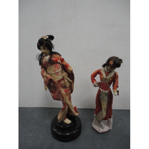 108 - Box containing modern dolls to include Oriental-style examples, cloth dolls and others.