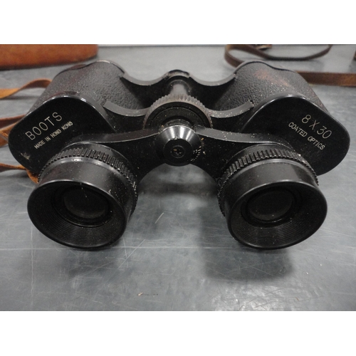 111 - Pair of Barr & Stroud military-issue binoculars, serial no. 64924, cased, another pair of Boots ... 