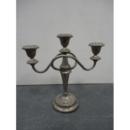 114 - Three reproduction candelabra and a pair of candlesticks.