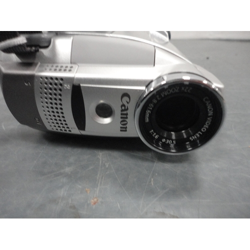 115 - Camera bag containing a Canon AS-6 camera, Chinon CE-5 camera with Tamron lens, accessories etc., an... 