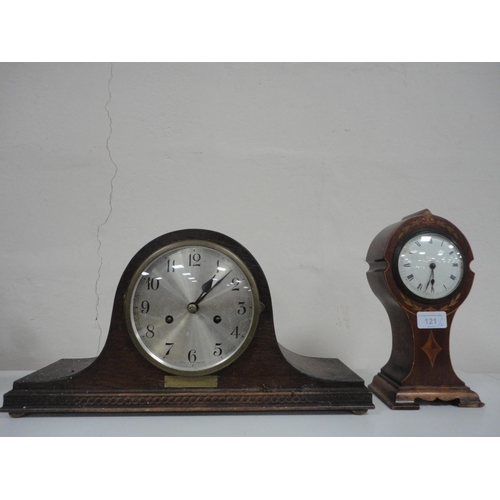 121 - Edwardian inlaid mahogany shaped mantel clock and a later oak mantel clock.  (2)