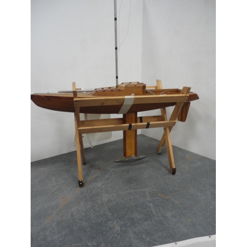 187 - Large scratch-built wooden pond yacht on a pine cradle stand.