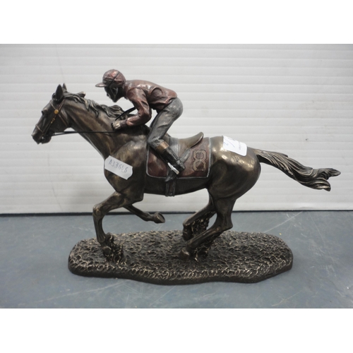 21 - Two reproduction horse and jockey figure groups to include an example from the Cellini Collection.  ... 