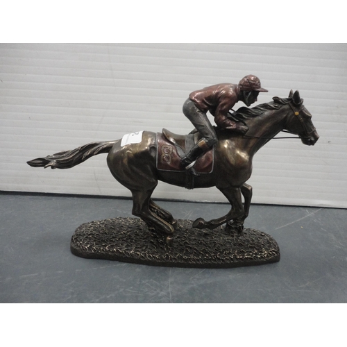 21 - Two reproduction horse and jockey figure groups to include an example from the Cellini Collection.  ... 