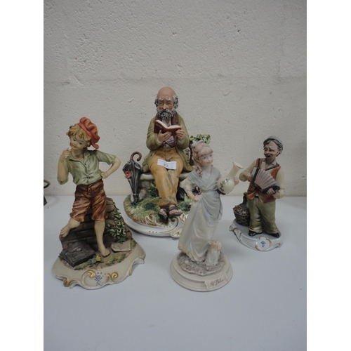 22 - Capodimonte figure group in the form of a man reading on a bench and three other similar figures.&nb... 