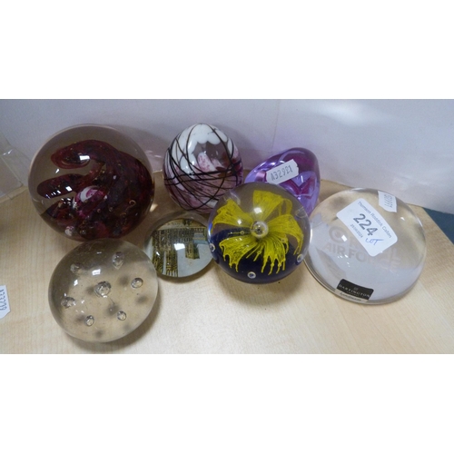 224 - Group of art glass paperweights to include Dartington examples.