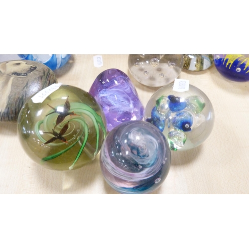 224 - Group of art glass paperweights to include Dartington examples.