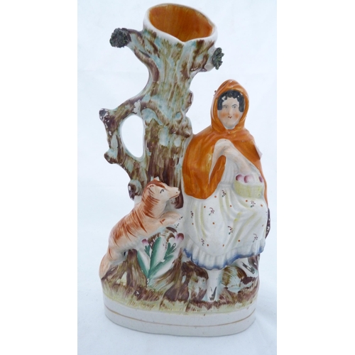 235 - Pair of Staffordshire flatback spill vases in the form of Little Red Riding Hood.  (2)