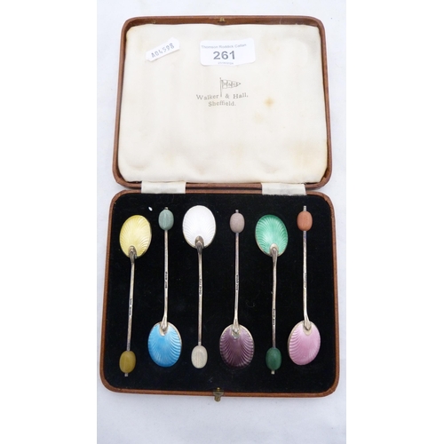 261 - Set of six silver and harlequin guilloché enamel coffee spoons with bean terminals, c. early ... 