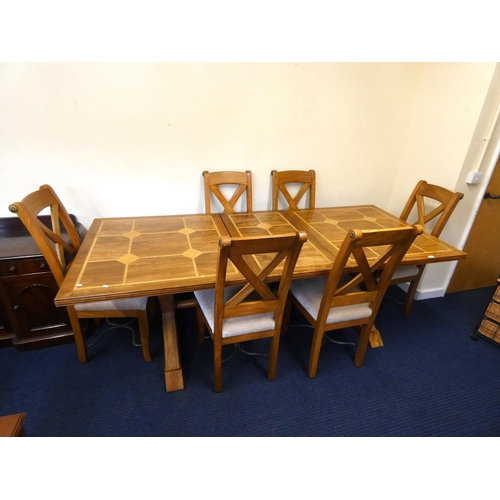 402 - Very large modern extending oak inlaid table with cross supporting legs and six matching chairs.L.23... 