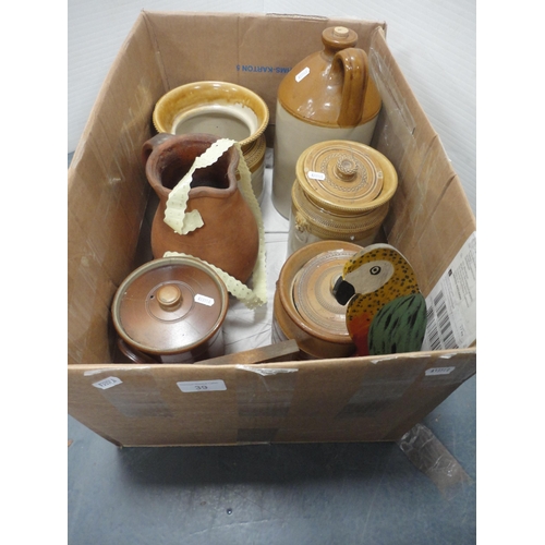 39 - Carton containing various stoneware jars, flagon, terracotta jug, wooden frame, painted wooden silho... 