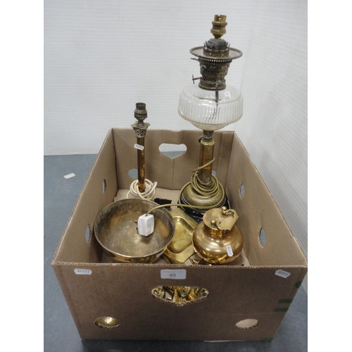 40 - Brassware to include wall masks, bells, Oriental-style vessel and cover, bowl, dish, oil lamp conver... 