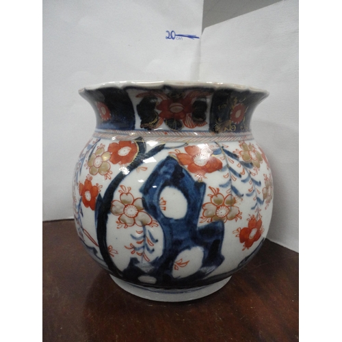 41 - Kangxi-style Chinese blue and white prunus ginger jar and cover with twin concentric marks to the un... 