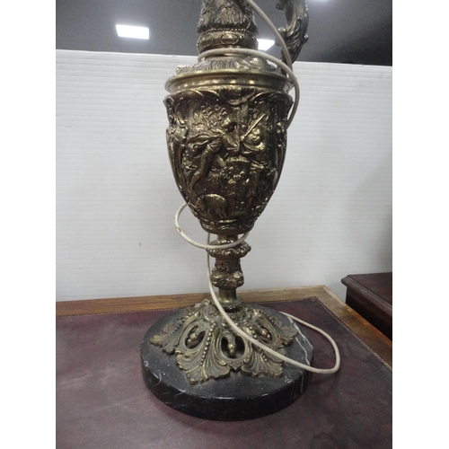 68 - Table lamp converted from a Continental brass ewer on a mottled marble stand.