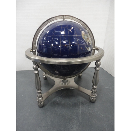 70 - Table revolving globe decorated with minerals picking out countries.