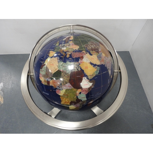 70 - Table revolving globe decorated with minerals picking out countries.