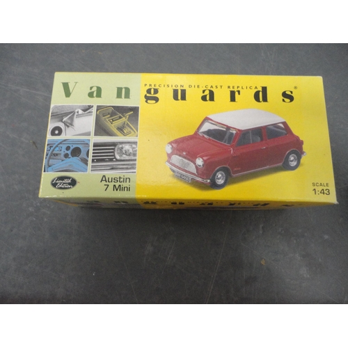 72 - Vanguard model of an Austin 7 Mini, boxed, a boxed Matchbox Ferrari Testarossa model, hand-painted B... 