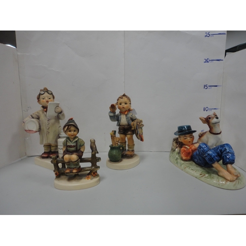 76 - Three Goebel Hummel figures and another Goebel figure.  (4)