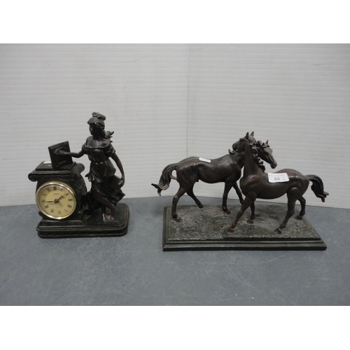94 - Bronzed figure group of two horses on a naturalistic base and a similar figural mantel clock.  (2)