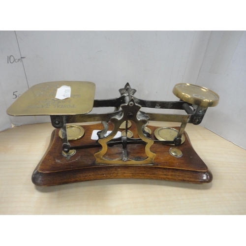 97 - Set of oak and brass postal scales with weights.