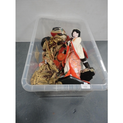 108 - Box containing modern dolls to include Oriental-style examples, cloth dolls and others.