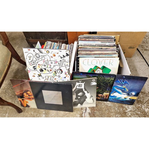 641 - Two boxes of mixed LPs, popular and alternative music including Led Zeppelin, Simple Minds, Police, ... 