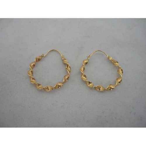 278 - Two pairs of 9ct gold earrings, 3.4g gross.