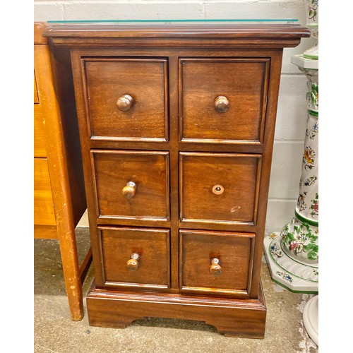 676 - Mahogany six drawer unit with glass protector