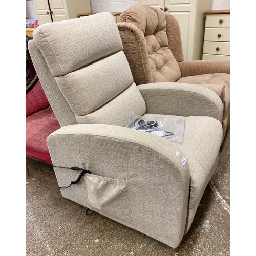 673 - Cream reclining arm chair and another arm chair 