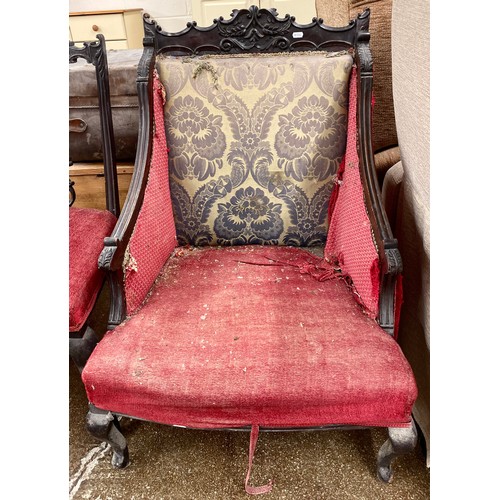 672 - Three antique ebonised side chairs and a matching arm chair