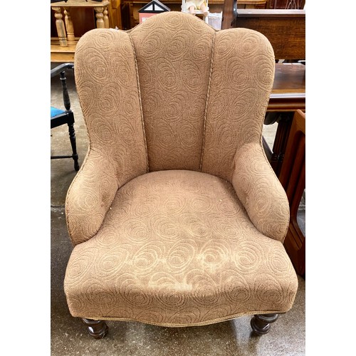 663 - Antique nursing chair on casters