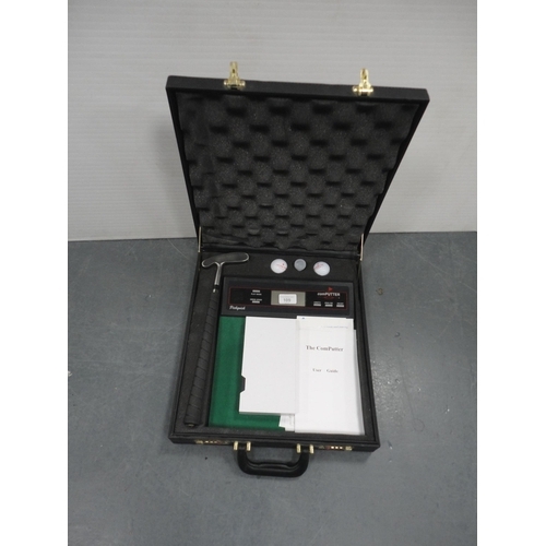 109 - Computerised golf game, 'The Computter', contained in a briefcase-style case.