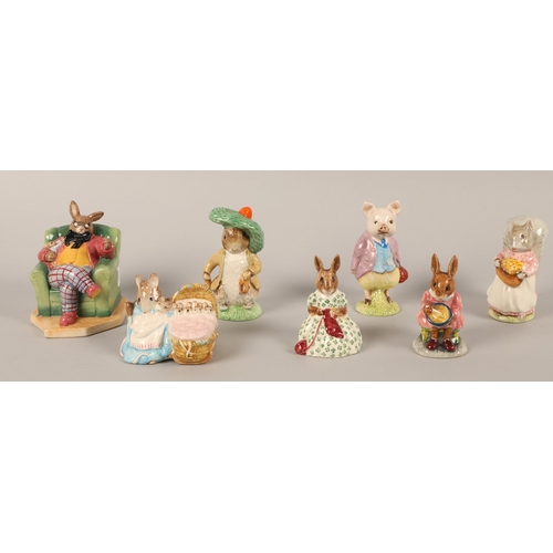 21 - Seven Royal Doulton, Royal Albert & Beswick figurines to include Bunnykins and Beatrix Potter