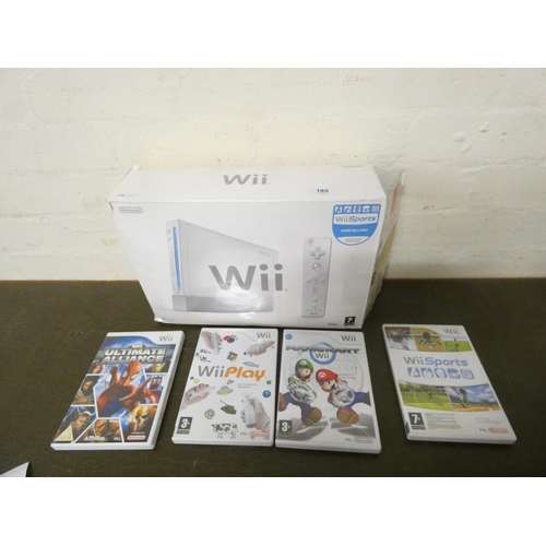 185 - Nintendo Wii games console and games.