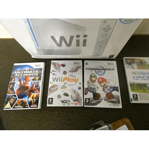 185 - Nintendo Wii games console and games.