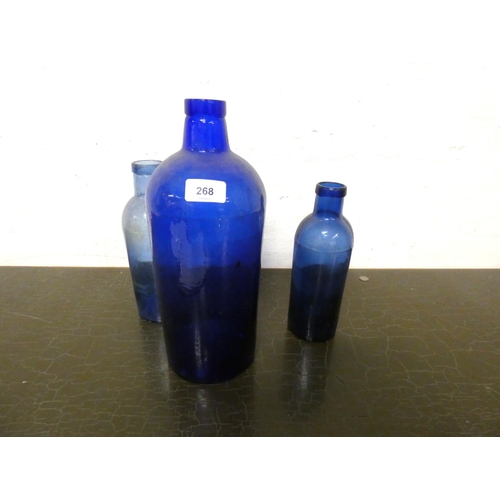 268 - Three large Bristol Blue apothecary bottles.