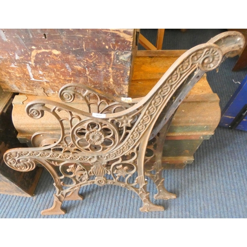 329 - Pair of cast iron bench ends.