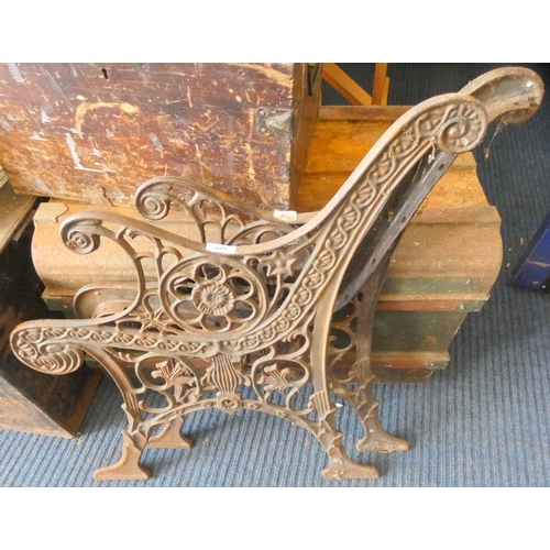 329 - Pair of cast iron bench ends.