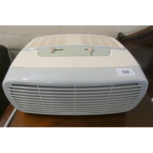 330 - Small vintage style electric heater.