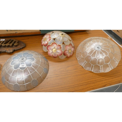 380 - Seven shell style vintage light shades.